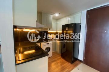 Kitchen Simply Look 2BR Apartment High Floor with City View at Casa Grande Apartment