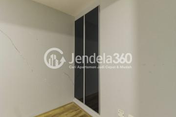 Bedroom 2 2BR Apartment with City View at Maqna Residence