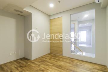 Bedroom 2 2BR Apartment with City View at Maqna Residence