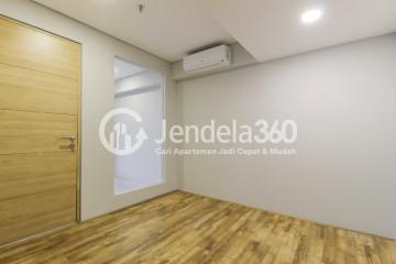 Bedroom 2 2BR Apartment with City View at Maqna Residence