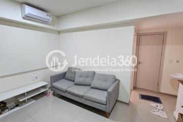 Living Room Middle Floor 2BR Apartment with City View at Meikarta Apartment