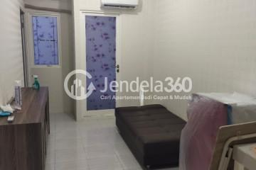 Living Room Restful 2BR Apartment Low Floor with  View at Puncak Dharmahusada Apartment Surabaya