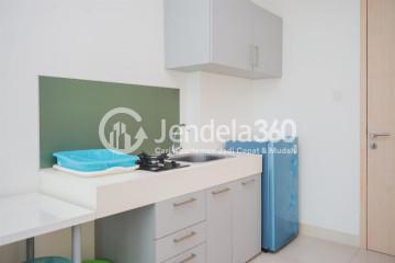 Kitchen High Floor 1BR Apartment with City View at Tree Park BSD