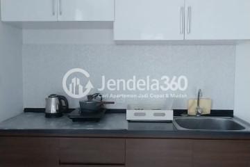 Kitchen High Floor 2BR Apartment with City View at Borneo Bay City Apartment