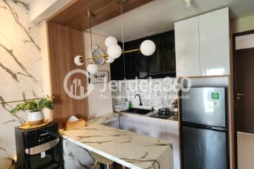 Kitchen 2BR Transpark Juanda Apartment at High Floor