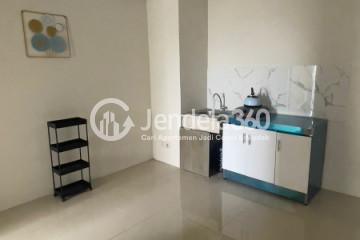 Kitchen Restful 2BR Apartment at Modernland Golf Apartment Tower Kuning