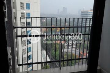 Balcony Middle Floor 2BR Apartment with City View at Casa Grande Apartment