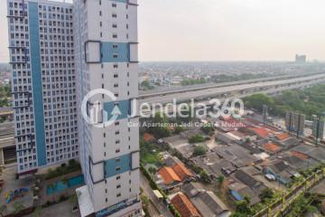 Balcony Middle Floor Studio Apartment with City View at LRT City Green Avenue Apartment