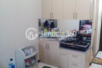 Kitchen Spotless Studio Apartment Middle Floor with City View at City Park Apartment