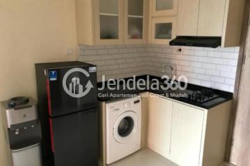 Kitchen Relaxed 1BR Apartment Middle Floor with City View at Pejaten Park Residence