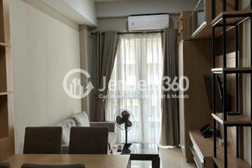 Living Room Peaceful 1BR Apartment Low Floor with City View at Grande Valore Condominium