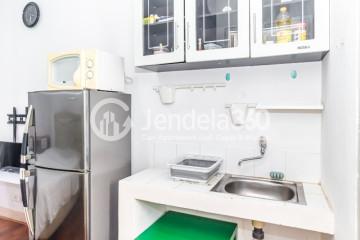 Kitchen Restful Studio Apartment at Green Bay Pluit Apartment Low Floor