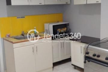 Kitchen Lovely 2BR Apartment at MOI Frenchwalk Tower Lyon Garden