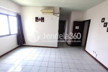 Living Room Homey 2BR Apartment Middle Floor with City View at Condominium Rajawali Apartment