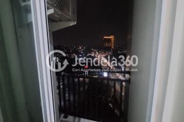 Balcony Middle Floor 2BR Apartment with Swimming Pool View at Thamrin District Bekasi