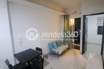 Living Room Middle Floor 2BR Apartment with Swimming Pool View at Thamrin District Bekasi