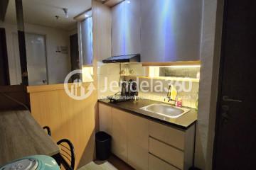 Kitchen Middle Floor 2BR Apartment with  View at Emerald Bintaro Apartment