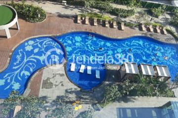 Balcony Studio Apartment with Swimming Pool View at Green Sedayu Apartment