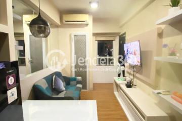 Living Room Middle Floor 2BR Apartment with City View at Puri Mas Apartment