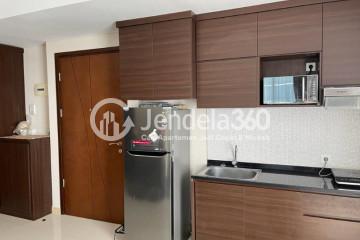 Kitchen 2BR Apartment with City View at Borneo Bay City Apartment