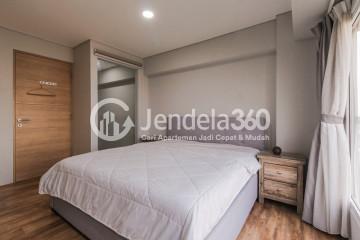 Bedroom 1 Low Floor 2BR Apartment with city View at Maqna Residence