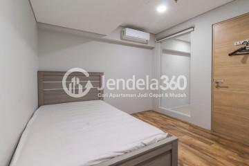 Bedroom 2 Low Floor 2BR Apartment with city View at Maqna Residence