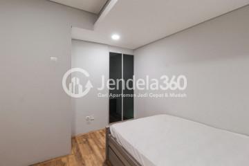 Bedroom 2 Low Floor 2BR Apartment with city View at Maqna Residence