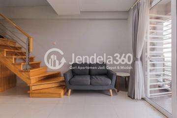 Living Room Low Floor 2BR Apartment with city View at Maqna Residence