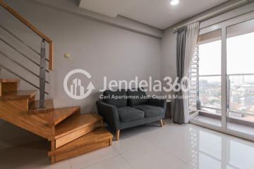 Living Room Low Floor 2BR Apartment with city View at Maqna Residence