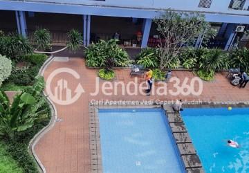 Balcony Low Floor 2BR Apartment with Pool View at Green Park View Apartment