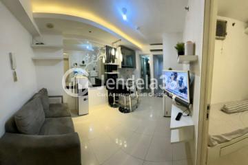 Living Room Relaxed 2BR Apartment at Bassura City Apartment Tower Geranium