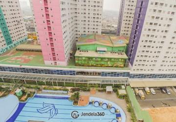 Balcony 2BR Green Pramuka City Apartment at Tower Magnolia