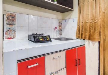 Kitchen Trendy Studio Apartment at Kebagusan City Apartment Tower C