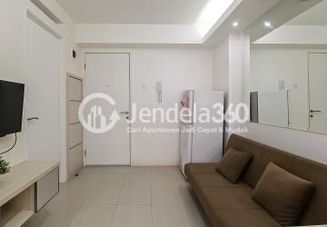 Living Room Lovely and Tidy 2BR Apartment with Water Heater at Bassura City Apartment Tower E