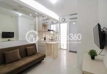 Living Room Lovely and Tidy 2BR Apartment with Water Heater at Bassura City Apartment Tower E